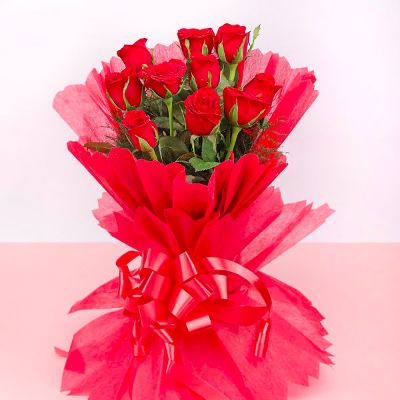 Red Roses in Red Paper Packing