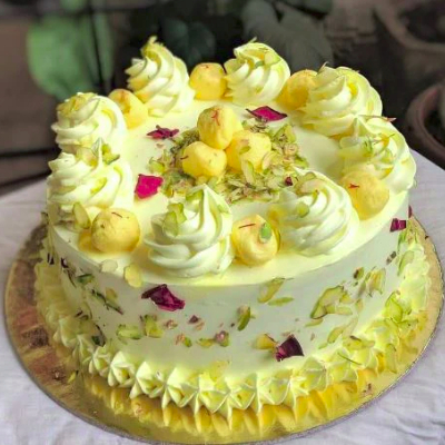 Attractive Yellowish Rasmalai Cake