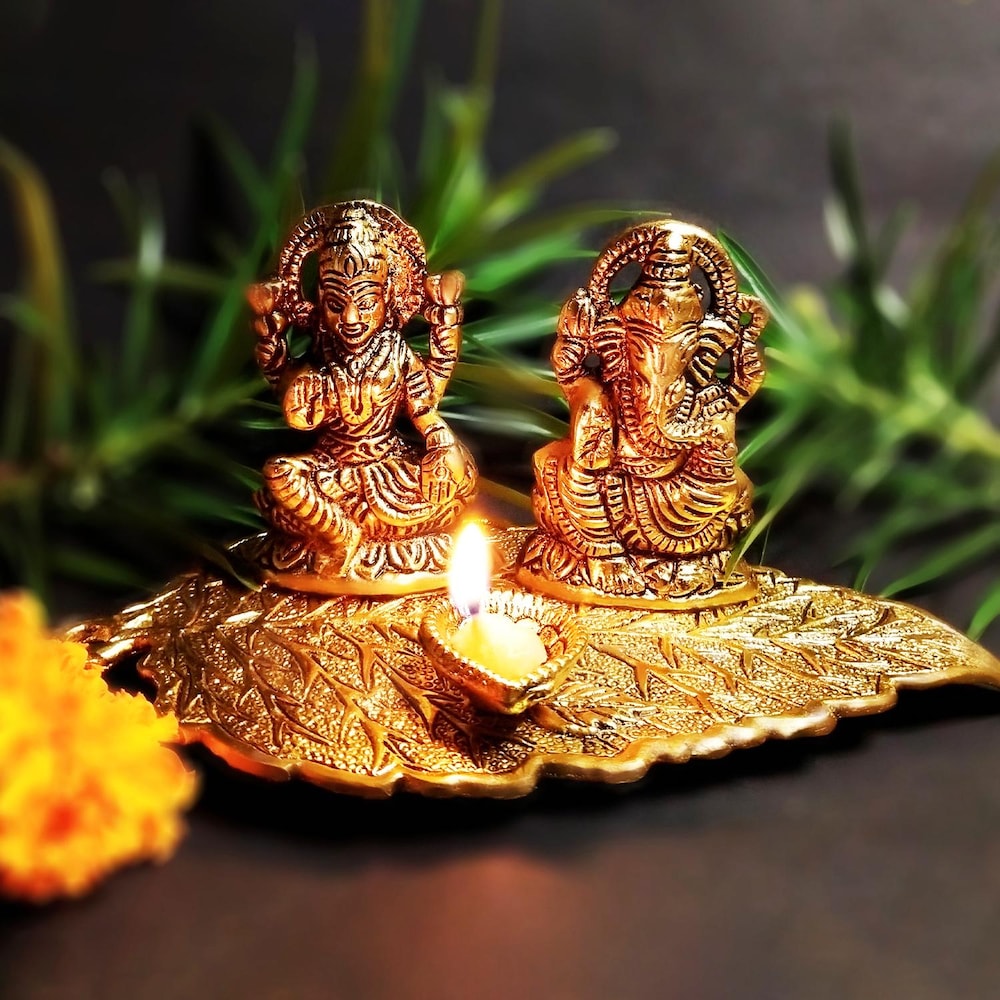  Golden Laxmi Ganesh On Leaf With Diya